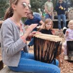 kid playing drums